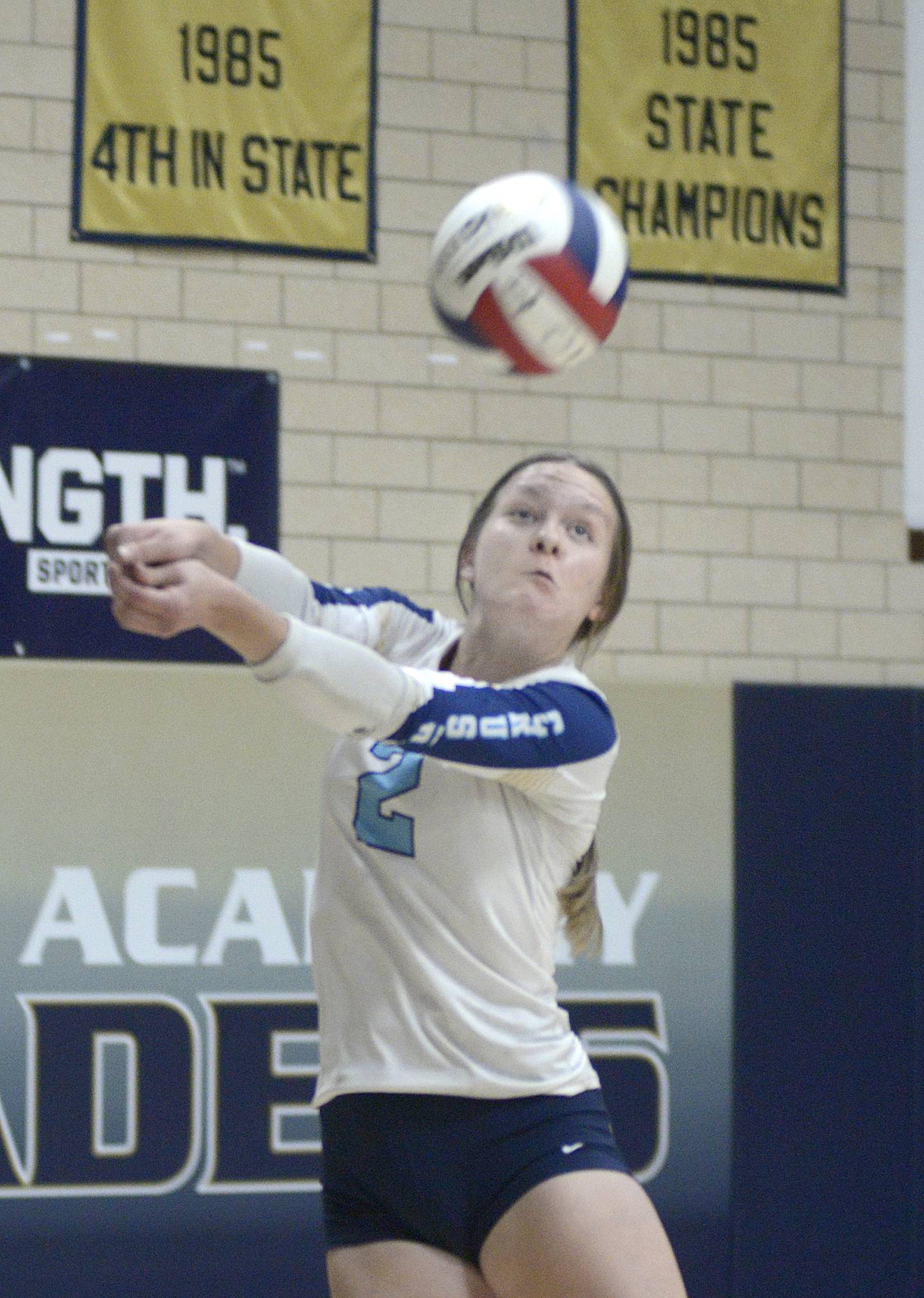 Marquette’s Emily Ryan-Adair sets to return this volley against Lexington in the first match Tuesday at Marquette.