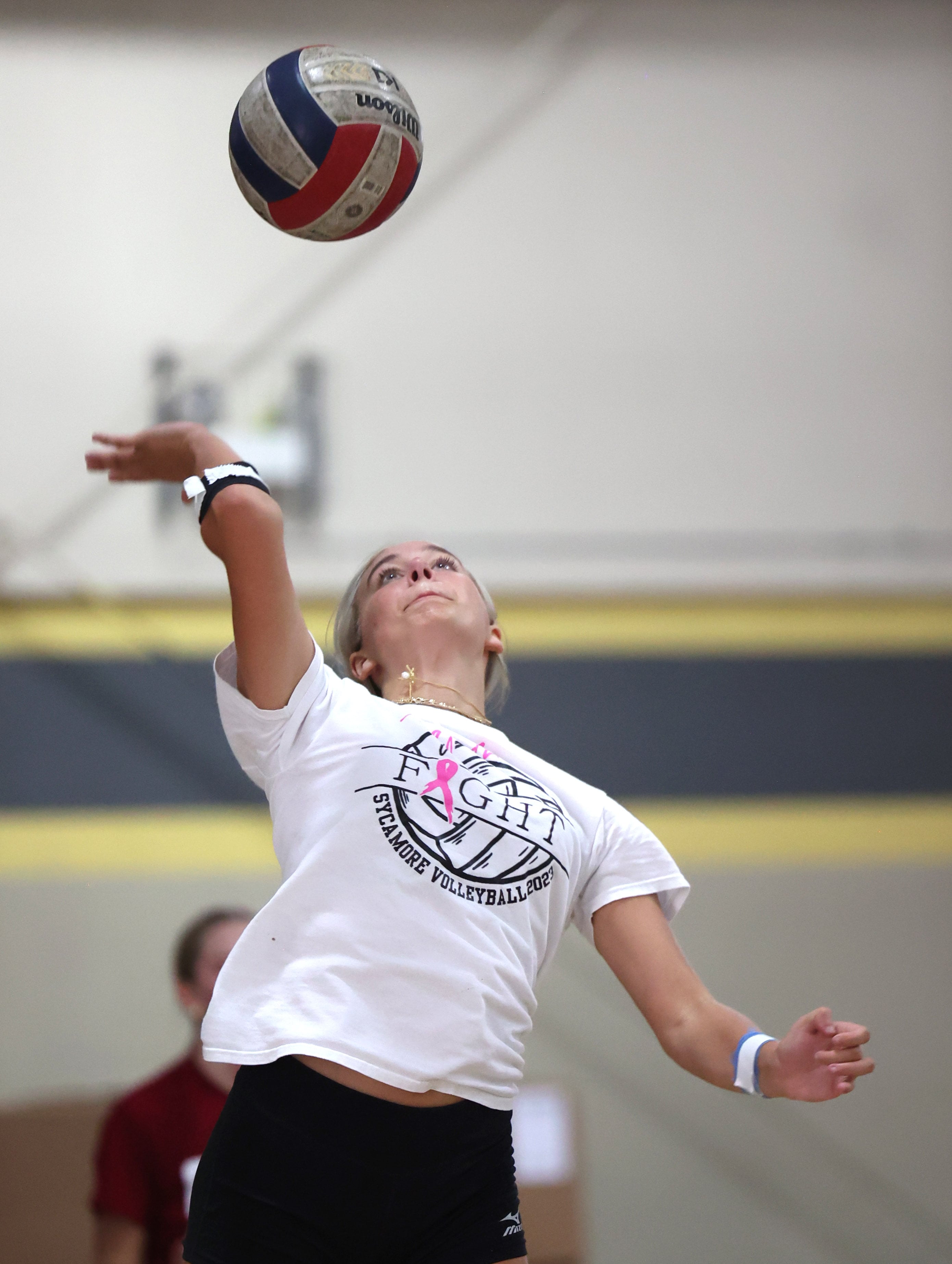 Lana Walker serves the ball during a drill at Sycamore High School volleyball camp Tuesday, July 23, 2024, at Sycamore High School.