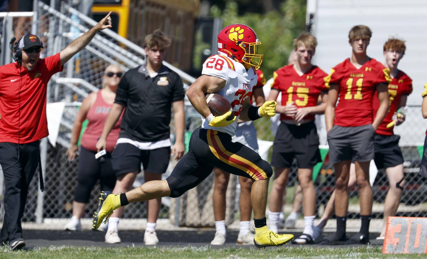 Batavia's Nathan Whitwell (28) breaks down the sideline for a touchdown Saturday, Aug. 31, 2024 at Duchon Field in Glen Ellyn.