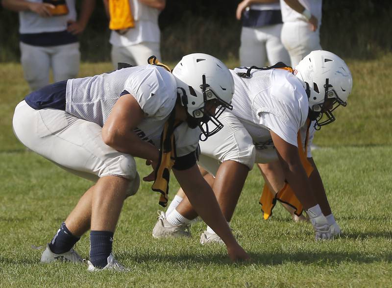 Ty Drayton  lines up to rush during football practice Tuesday, Aug. 20, 2024, at Cary-Grove High School, as the 2023 IHSA Class 6A champions look to defend their title.