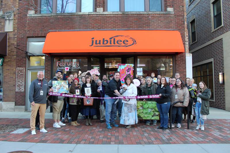 The DeKalb Chamber of Commerce celebrating Jubilee's opening with a ribbon-cutting