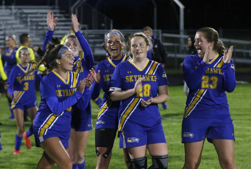 Johnsburg players celebrate their 4-3 victoryy over Marian Central in the IHSA Class 1A Marengo Regional championship soccer match on Tuesday, May 14, 2024, at Marengo High School.