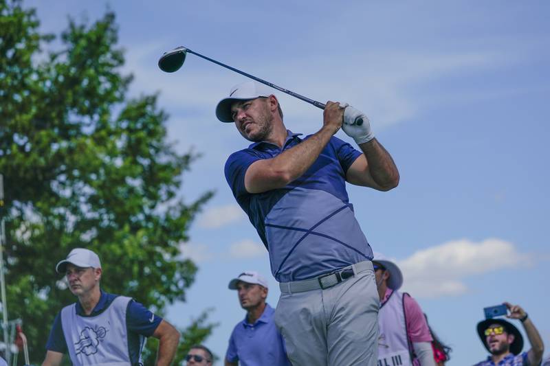 Brooks Koepka hits off the 10th tee during the second round of the Bedminster Invitational LIV Golf tournament in Bedminster, N.J., Saturday, July 30, 2022.