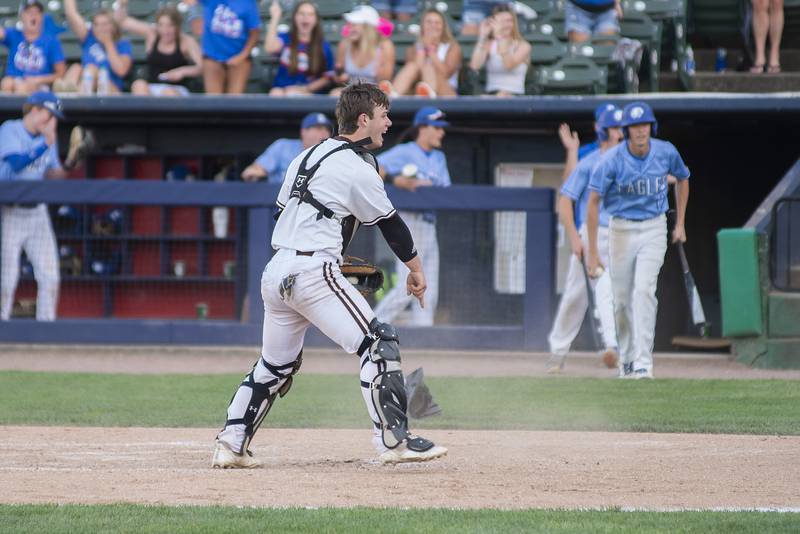 Joliet Catholic’s Ryan Louthan argues with a call at the plate against Columbia Friday, June 3, 2022 during the IHSA Class 2A baseball state semifinal.
