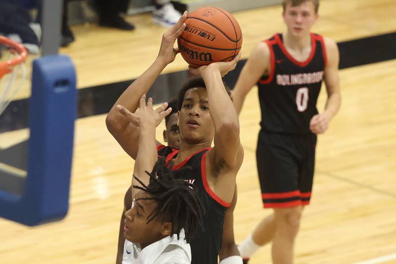 Bolingbrook’s Davion Thompson puts up a shot against Lincoln-Way East on Tuesday, Dec.12th, 2023 in Frankfort.