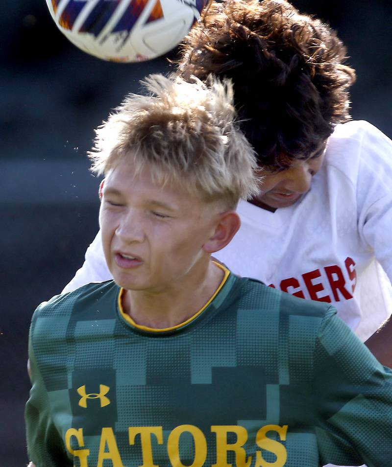 Dundee-Crown's Hugo Arista battles with Crystal Lake South's Josh Moreno to head there ball during a Fox Valley Conference soccer match on Tuesday, Sept. 10, 2024, at Crystal Lake South High School.