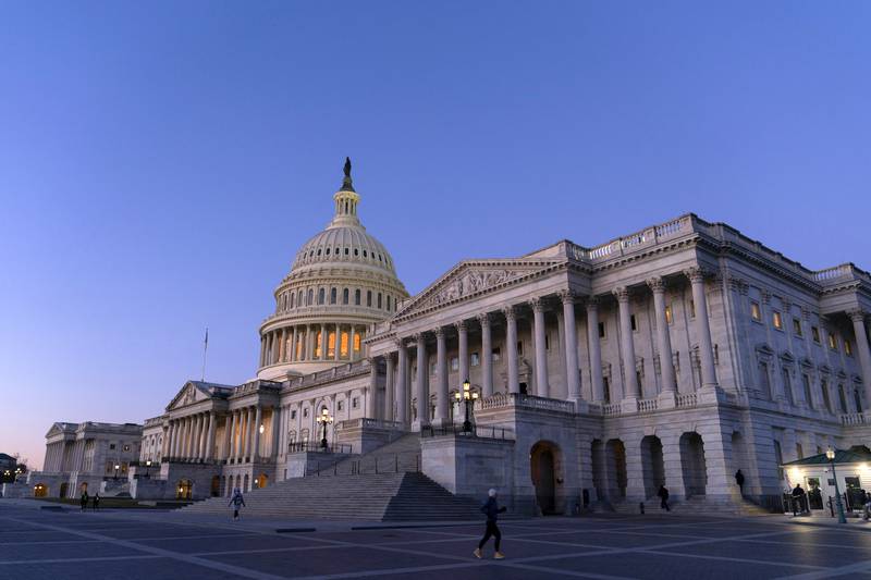 The U.S. Capitol is seen at sunrise, Wednesday, Feb. 7, 2024, in Washington. A Senate deal on border enforcement measures and Ukraine aid has suffered swift and total collapse. Republicans withdrew support despite President Joe Biden urging Congress to “show some spine” and stand up to Donald Trump. But Senate Republican Leader Mitch McConnell says that a deal to pair border policy changes with $60 billion in wartime aid for Ukraine is dead.  (AP Photo/Jose Luis Magana)