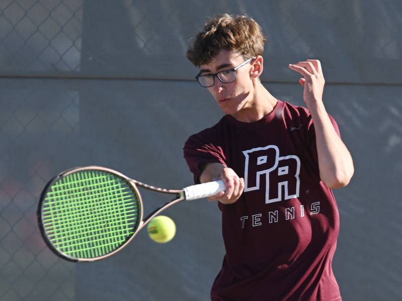 Tim Jones of Prairie Ridge returns the ball during Class 1A doubles consolation semifinal of the boys state tennis tournament at Palatine High School on Saturday, May 25, 2024 in Palatine.
