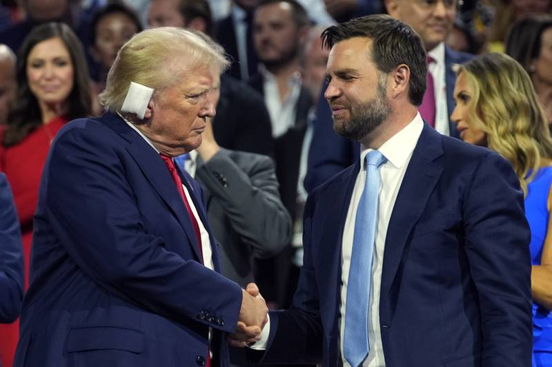 Republican presidential candidate former President Donald Trump and Republican vice presidential candidate Sen. JD Vance, R-Ohio, attend the first day of the Republican National Convention, Monday, July 15, 2024, in Milwaukee. (AP Photo/Evan Vucci)