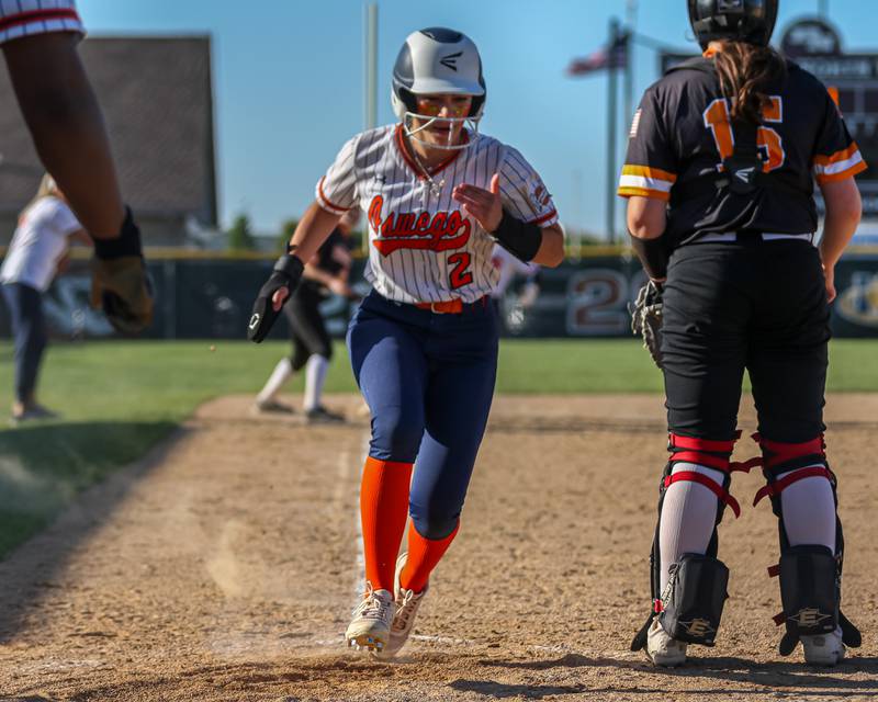 Oswego's Rhiana Martinez (2) crosses home plate to score a run during Class 4A Plainfield North Sectional semifinal softball game between Wheaton-Warrenville South at Oswego. May 29th, 2024.