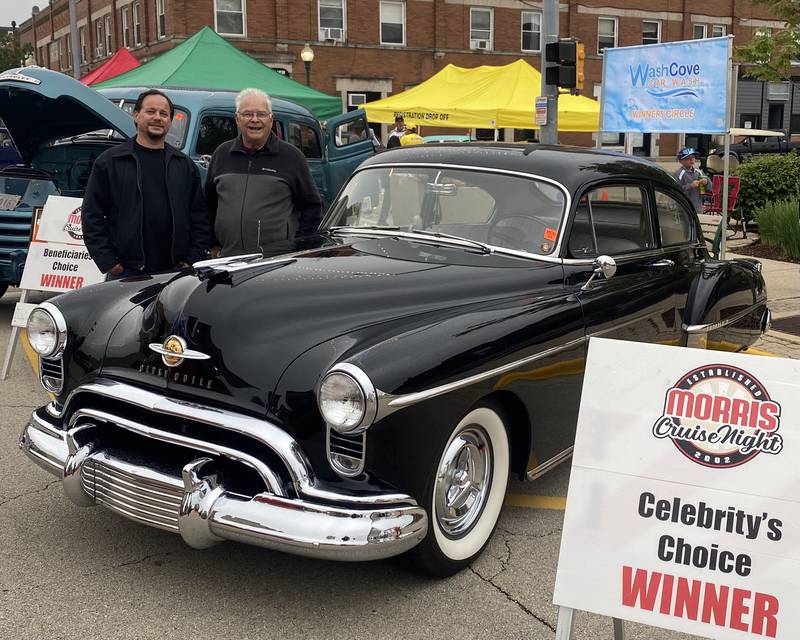 Ralph Tosti (left) with Timothy Airney behind the Celebrity's Choice award-winning 1950 Oldsmobile 88.