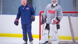 Crystal Lake resident, NHL assistant coach Kenny McCudden pitches in at D155 Predators practice