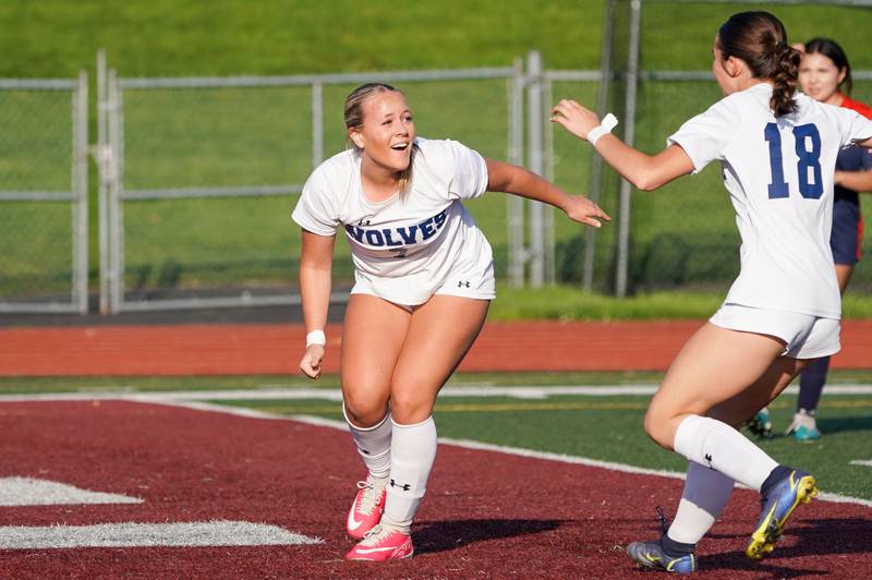 Oswego East's Gabby McPhee (7) smiles after scoring a goal against Oswego during a Class 3A Lockport Regional semifinal soccer match at Lockport High School in Lockport on Wednesday, May 15, 2024.