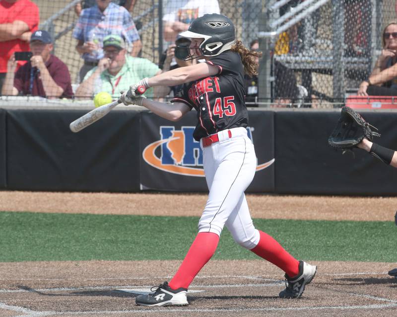 Benet Academy's Gianna Cunningham makes contact with the ball against Benet Academy during the Class 3A State third place game on Saturday, June 10, 2023 at the Louisville Slugger Sports Complex in Peoria.