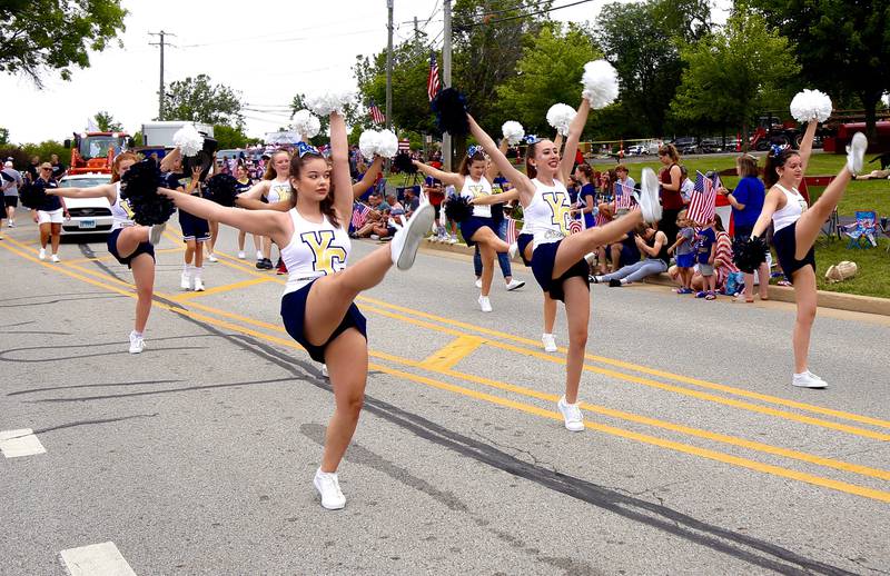 Cheerleaders from Yorkville Christian march in the Yorkville Independence Day Parade on Thursday, July 4, 2024 in Yorkville.