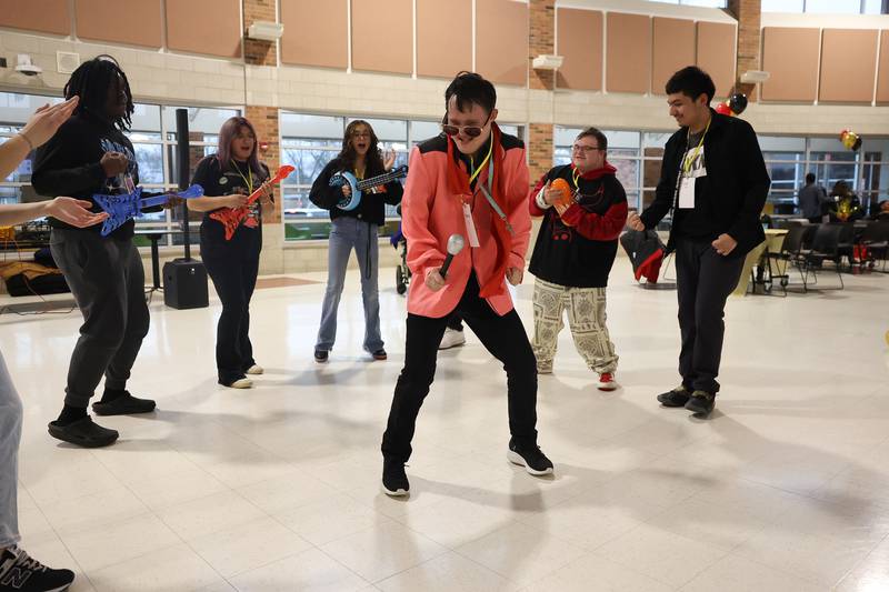 Westin Wenrenburg shows off his moves at the annual Special Population Dance hosted by Joliet West high school on Friday, March 22, 2024.