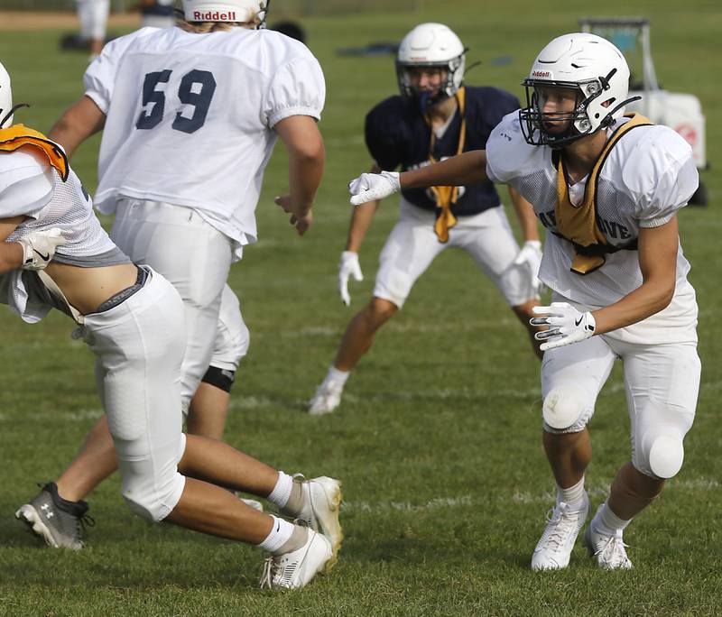 Preston Walsh plays defense during football practice Tuesday, Aug. 20, 2024, at Cary-Grove High School, as the 2023 IHSA Class 6A champions look to defend their title.