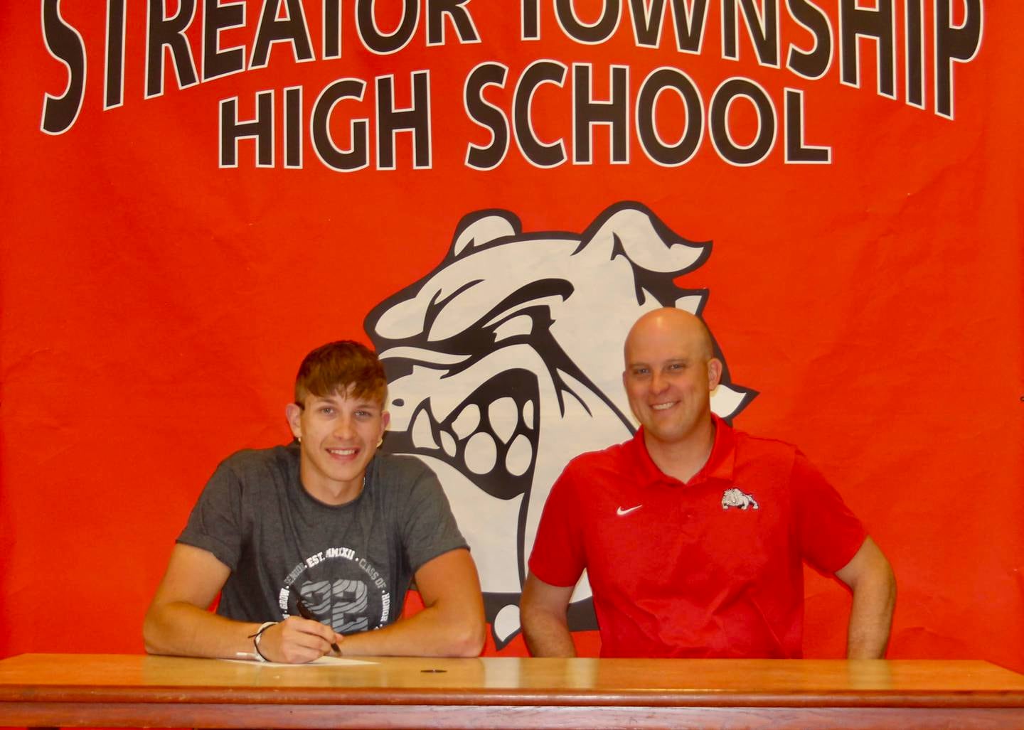 Recent Streator High School graduate Jack Haynes has committed to continue his academic career at Loras College and his basketball career at the NCAA Division III level with the Duhawks. Pictured here is Haynes alongside Streator boys basketball coach Beau Doty.