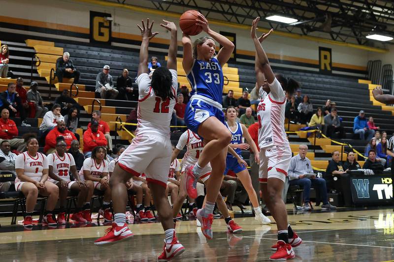 Lincoln-Way East’s Lana Kerley looks to pass against Homewood-Flossmoor in the Class 4A Joliet West Sectional championship on Thursday, Feb. 22nd in Joliet.