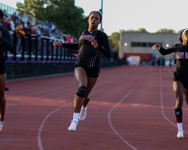 Plainfield North's Taylor McClain finishes second in the 100-meter dash at Friday's Class 3A Downers Grove North Sectional girls track and field meet.