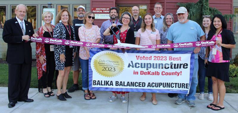 The DeKalb Chamber of Commerce welcoming Balika Balanced Acupuncture with a ribbon-cutting