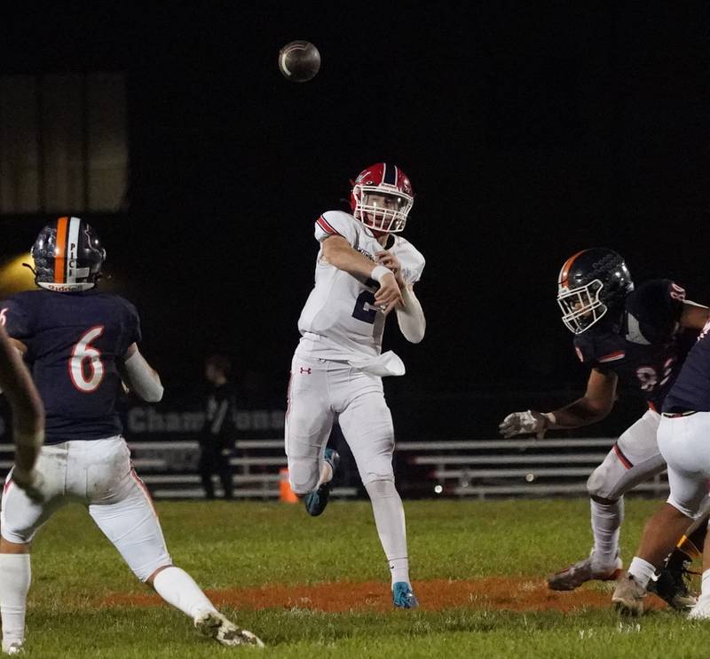 West Aurora's Mason Atkins (2) throws a pass against Oswego during a football game at Oswego High School on Friday, Sept. 29, 2023.