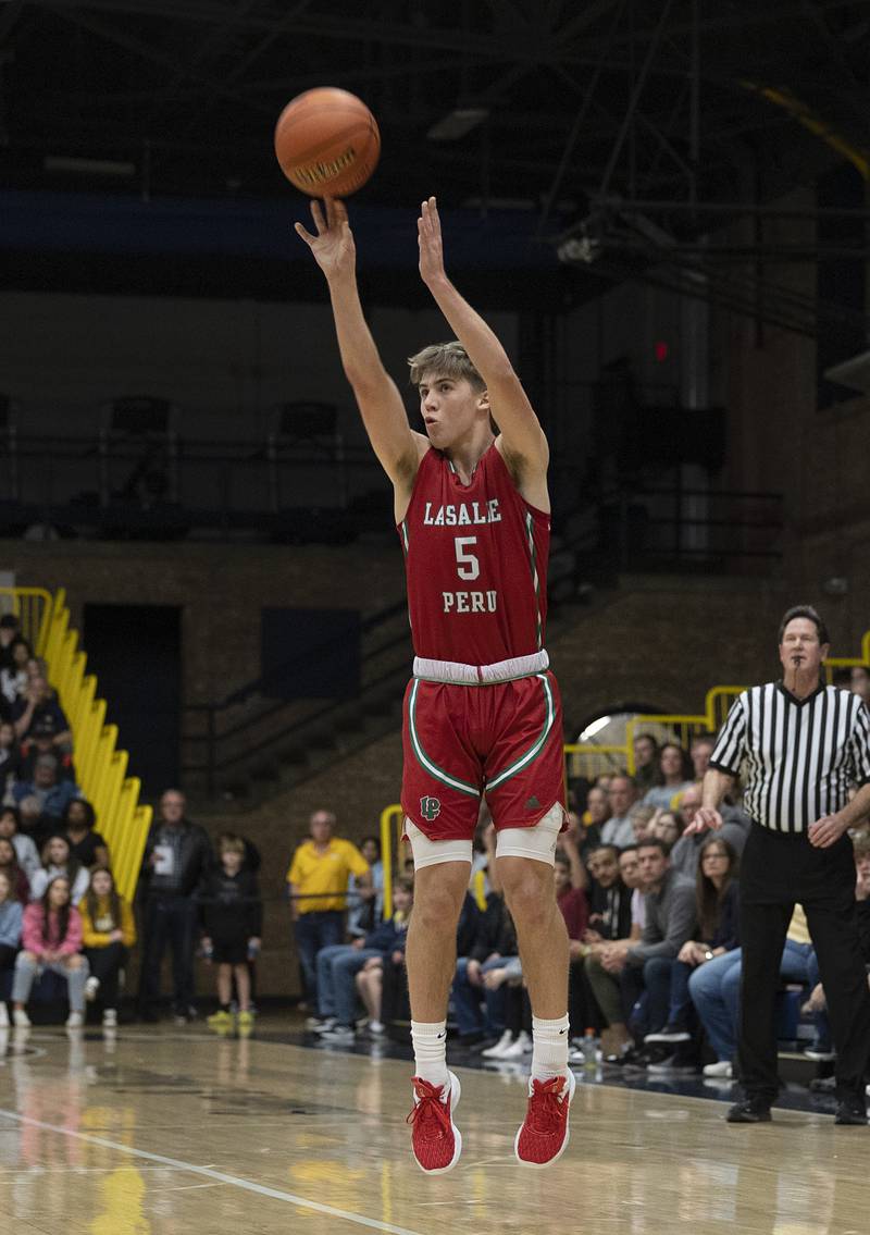 LaSalle-Peru’s Seth Adams puts in a three-pointer against Sterling Friday, Feb. 23, 2024 during a class 3A regional final at Sterling High School.