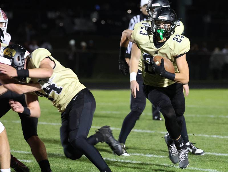 Sycamore's Dylan Hodges carries the ball during their game against Morris Friday, Oct. 18, 2024, at Sycamore High School.