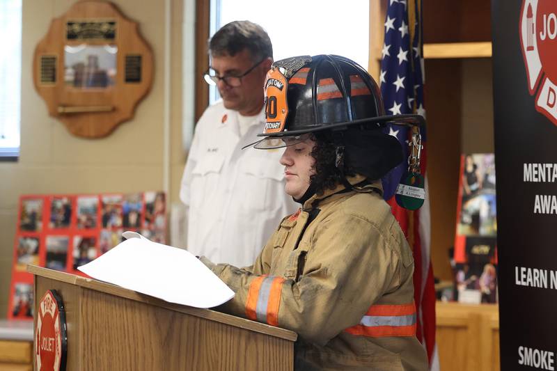 Acey Longley, now a volunteer firefighter in Kentucky, shares a few words about his mentor Joliet Battalion Chief Jim Blake at the annual pizza party host by Acey and his mother, Heidi, on Wednesday, Sept. 11, 2024 in Joliet.