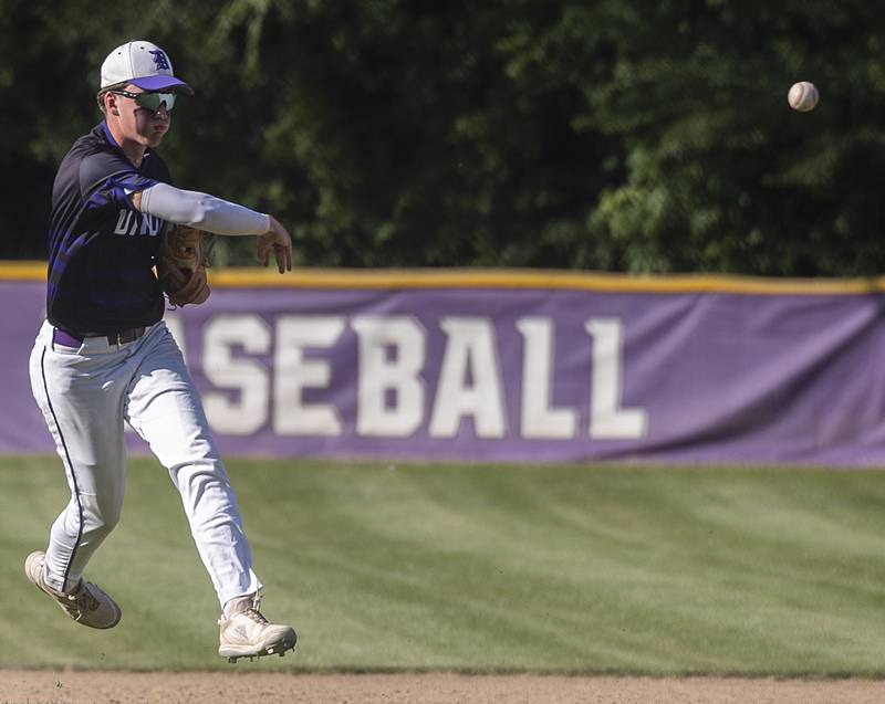 Dixon’s Quade Richards throws to first for an out against Freeport Thursday, May 23, 2024 during the Class 3A regional semifinal in Dixon.