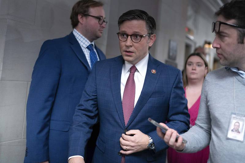 Rep. Mike Johnson, R-La., vice chair of the House GOP Conference talks to reporters as he arrives to the Republican caucus meeting at the Capitol in Washington, Tuesday, Oct. 24, 2023. (AP Photo/Jose Luis Magana)