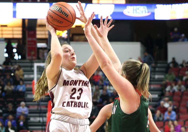 Montini's Shea Carver shoots over a Lincoln defender during their game Friday, March 1, 2024, in the IHSA Class 3A state semifinal at the CEFCU Arena at Illinois State University in Normal.