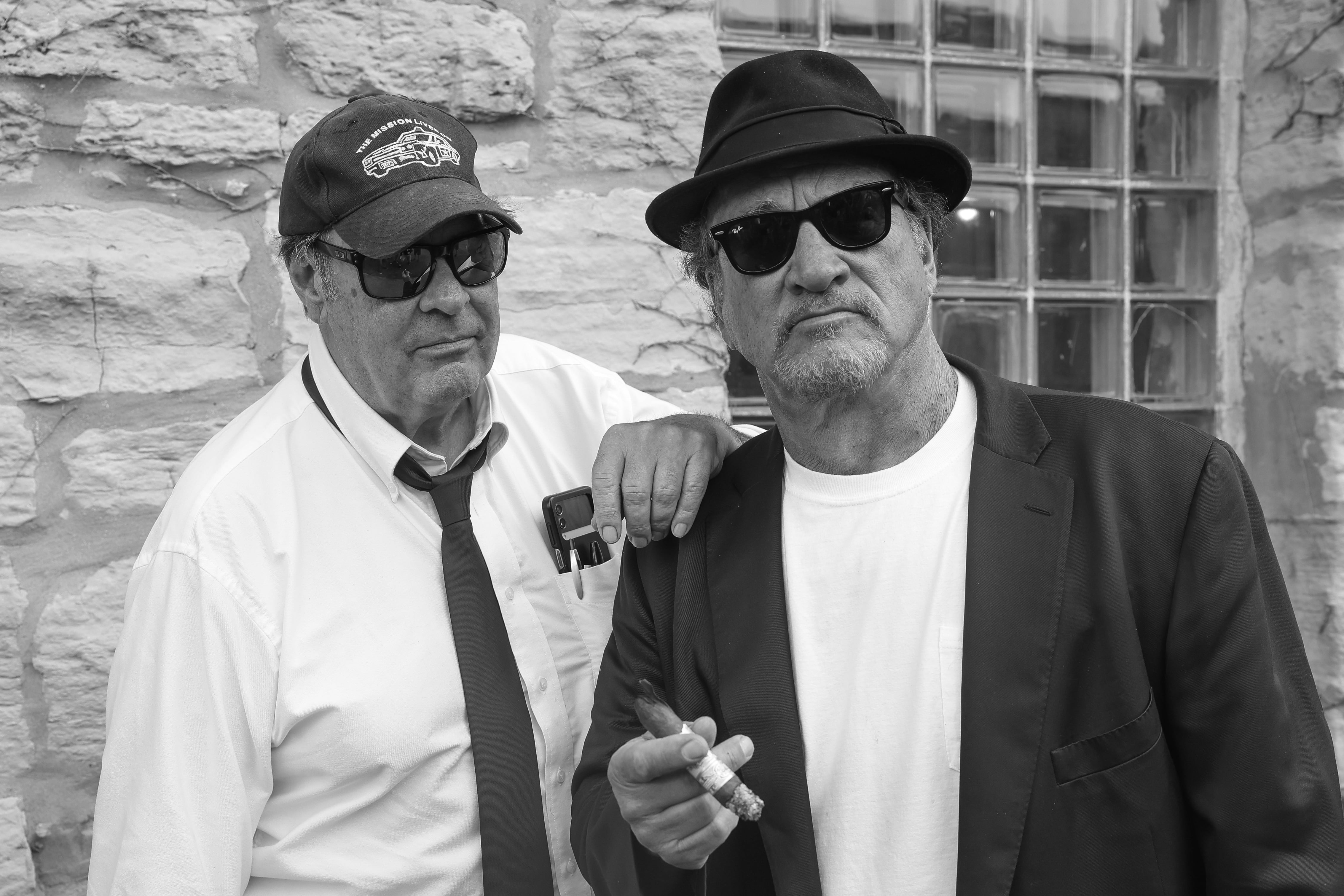 Dan Aykroyd and Jim Belushi pose for a photo at Blues Brothers Con: The Sequel on Saturday, Aug. 17, 2024 at the Old Joliet Prison.