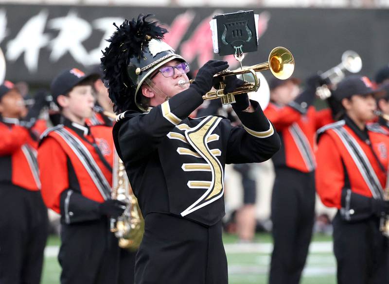 The combined Sycamore and DeKalb bands play the National Anthem Friday, Aug. 30, 2024, before the FNBO Challenge at Huskie Stadium at Northern Illinois University.