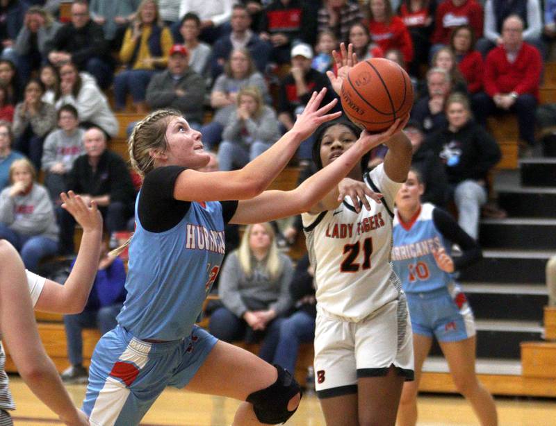 Marian Central’s Madison Kenyon works under the hoop against Byron in Class 2A Regional Championship action at Rockford Christian Friday.