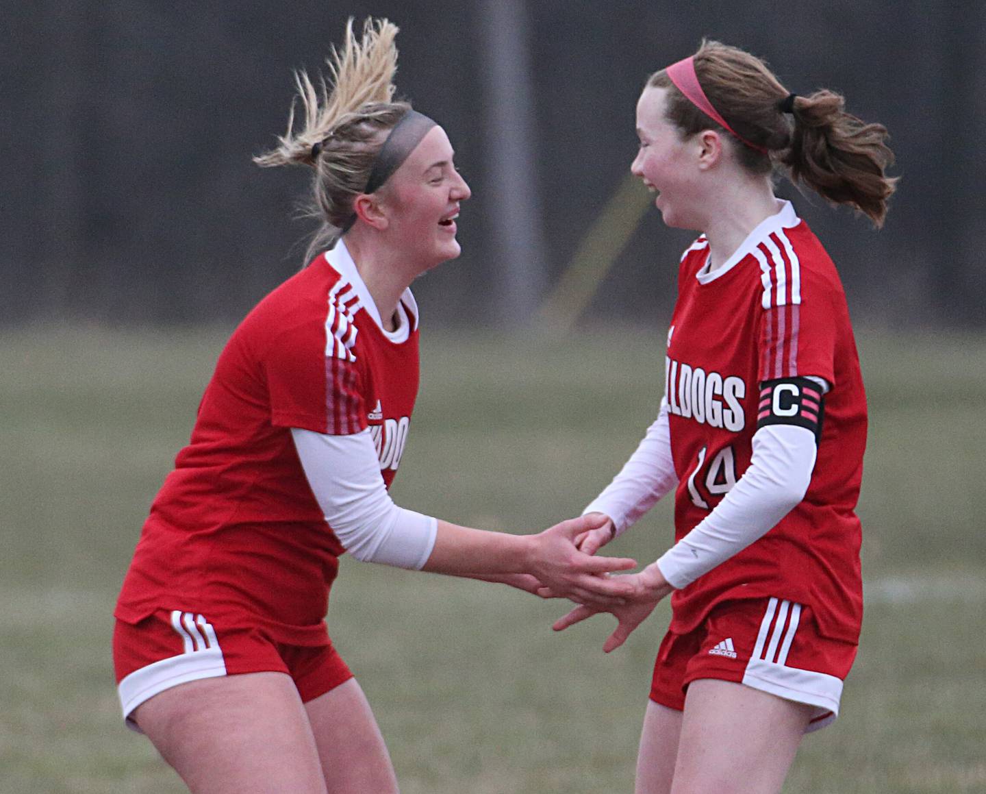 Streator's Josie Goerne celebrates with teammate Bridget McGurk during the 2023 season.