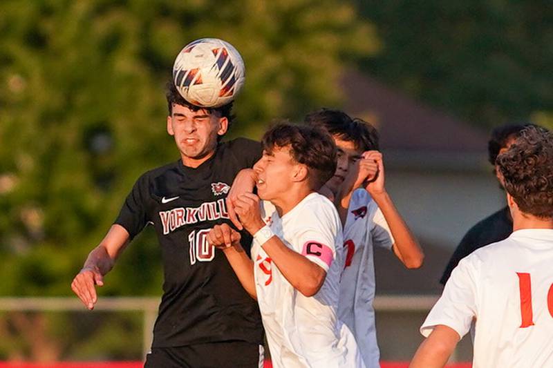 Yorkville's Lukas Kleronomos (10) scores a game tying goal late in the second half off a header against Oswego during a soccer match at Yorkville High School on Tuesday, Sep 17, 2024.