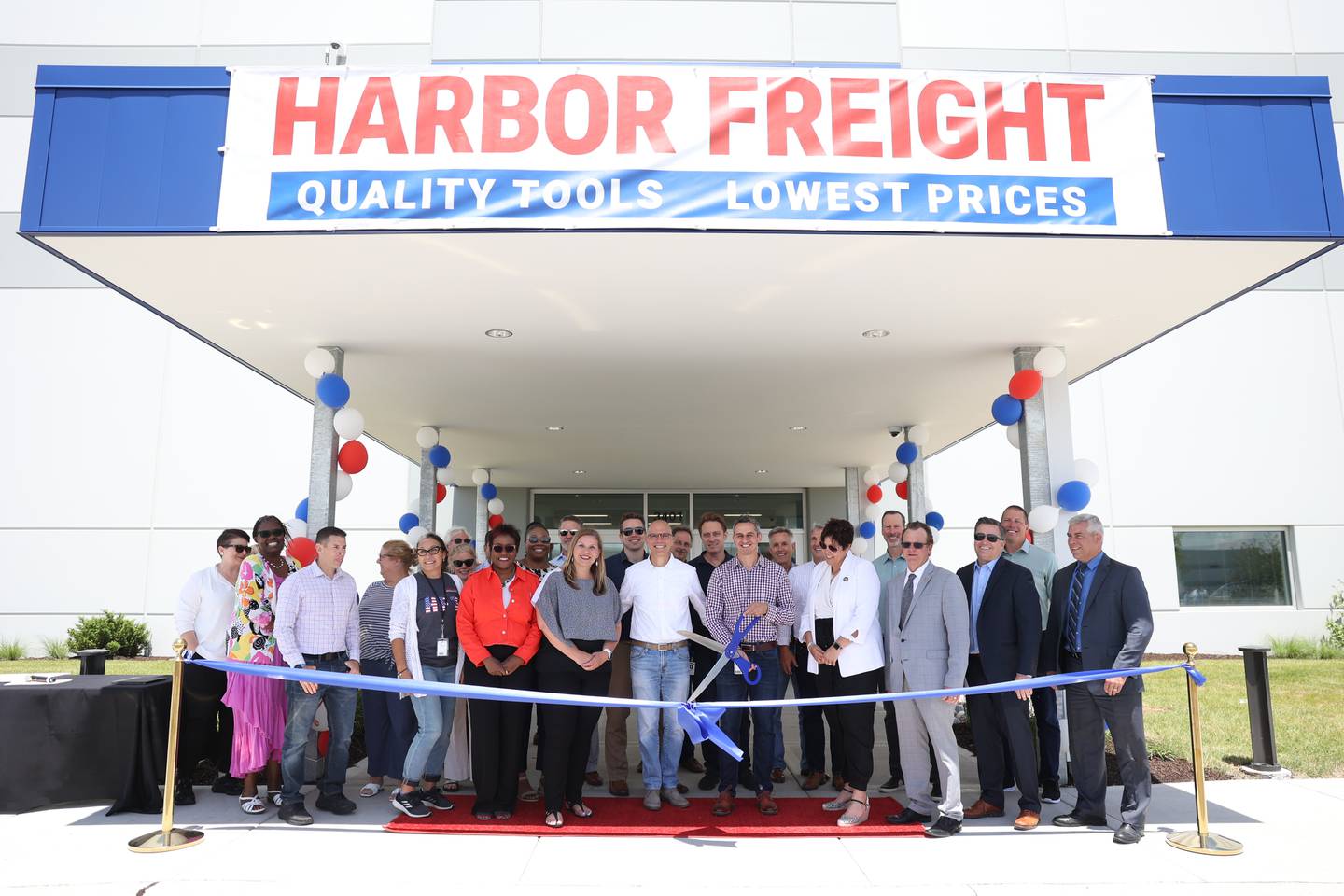 Harbor Freight representatives along with Joliet officials and members of Joliet Township School District 204 pose for a photo before the ribbon cutting at the new Harbor Freight facility. Harbor Freight opened a new 1.6 million square-foot distribution center in Joliet that is expected to bring 800 new jobs to the area. Thursday, June 9, 2022 in Joliet.Harbor Freight opened a new 1.6 million square-foot distribution center in Joliet that is expected to bring 800 new jobs to the area. Thursday, June 9, 2022 in Joliet.