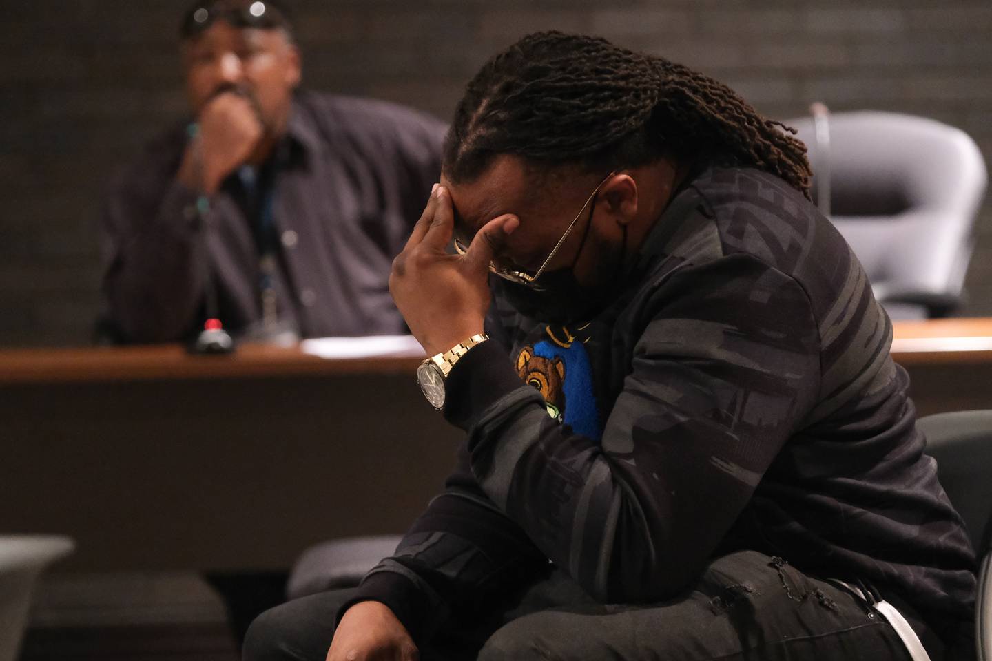 Karl Ferrell, Joliet Township Trustee, puts his head in his hand as committee members talk on when to meet again regarding the Police Department Citizen Advisory Board proposal at the Council Chambers in Joliet City Hall. Monday Nov. 8, 2021.