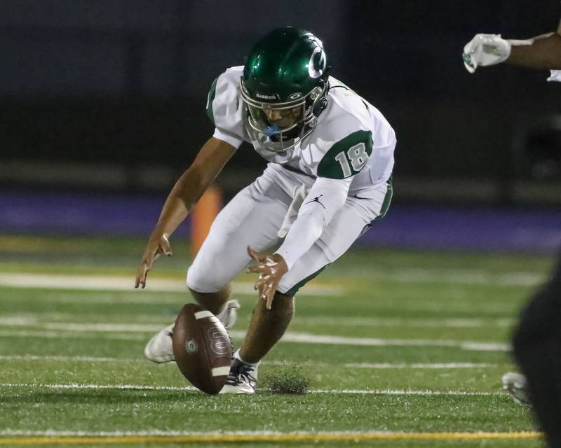 Glenbard West's Oliver Valdez (18) chases down a lose ball during a football game between Glenbard West at Downers Grove North on Friday, Sept 13th, 2024  in Downers Grove.