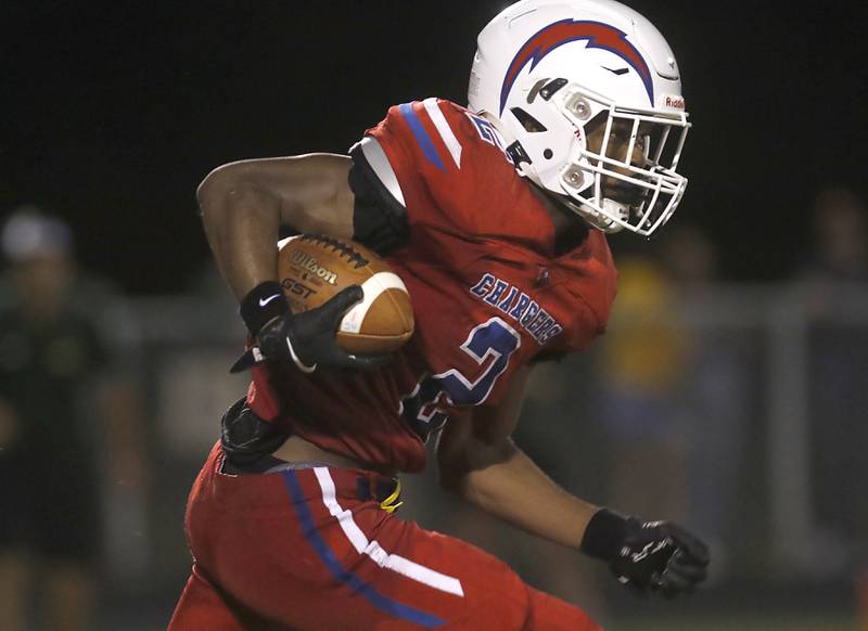 Dundee-Crown's Terrion Spencer runs with the ball during a Fox Valley Conference football game against Crystal Lake South on Friday, Aug 30, 2024, at Dundee-Crown High School in Carpentersville.