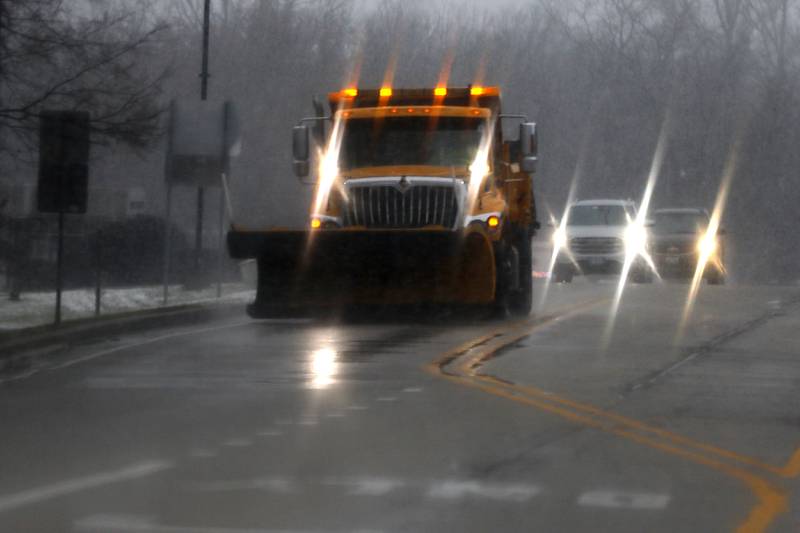 A Mchenry Township snowplow travels along North Johnsburg Road in Johnsburg as a winter storm moves through McHenry County on Tuesday, Jan. 9, 2024, delivering snow to most of the county.