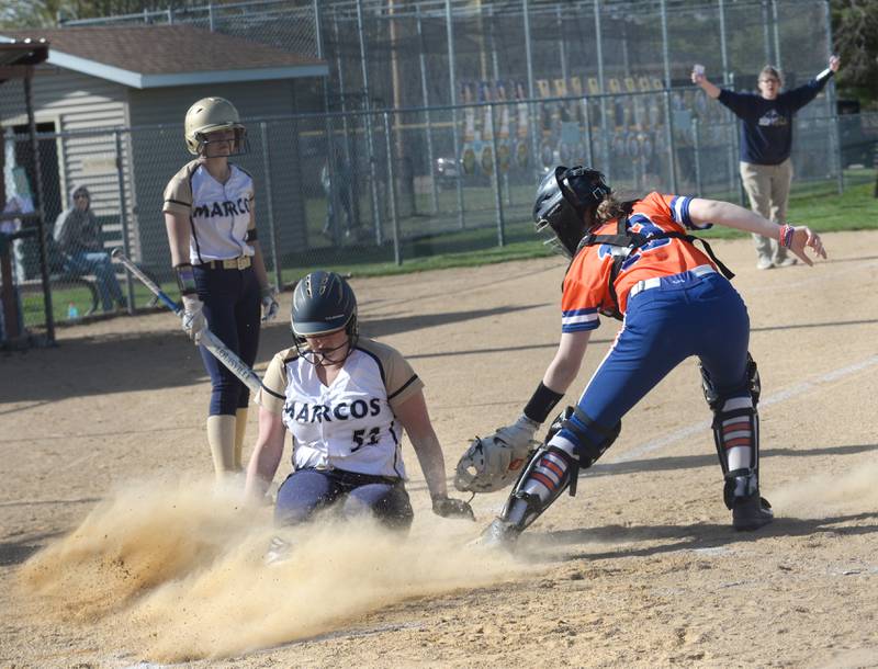 Polo's Leah Tobin slides safely into home against Eastland during a Tuesday, April 23, 2024 game at Westside Park in Polo.