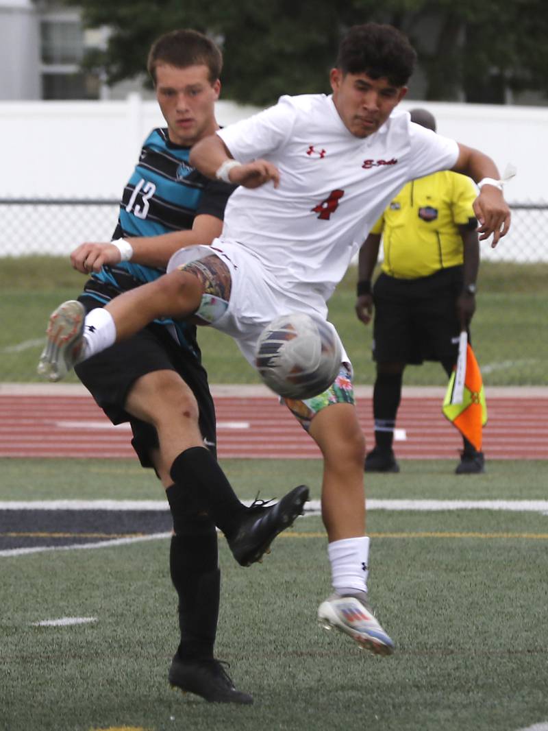 Woodstock North's Logan Barnes battles with Rockford East's Jonah Mandujano for the ball during a nonconference soccer match on Thursday, Sept. 5, 2024, at Huntley High School.