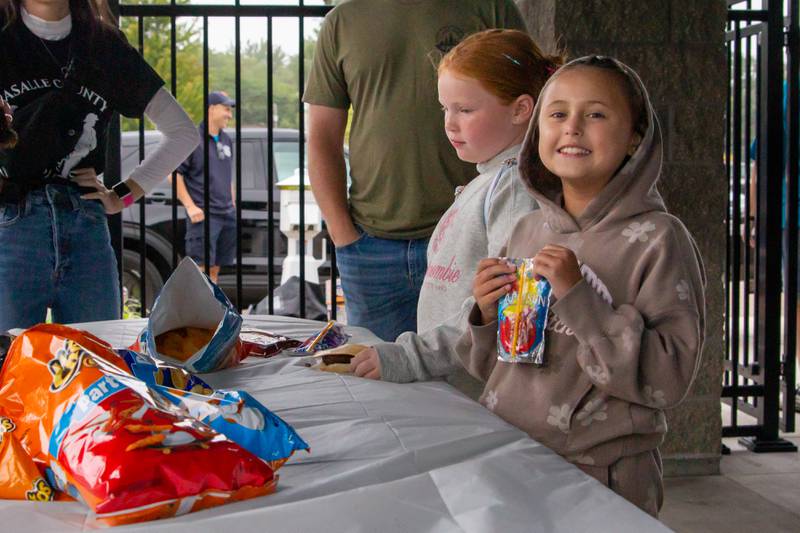 (Left) Kynlee Olson and Gg Riva (Right) attend Ottawa’s National Night out event on Tuesday, August 6, 2024 at Riordan Pool.