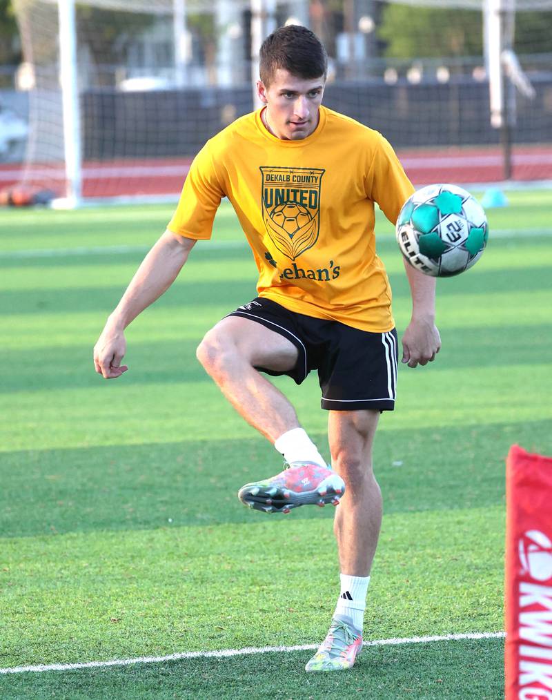 DeKalb County United’s Ronan Wilcox, from Arlington Heights, plays soccer tennis Thursday, June 6, 2024, during practice at the Northern Illinois University Soccer and Track and Field Complex in DeKalb.