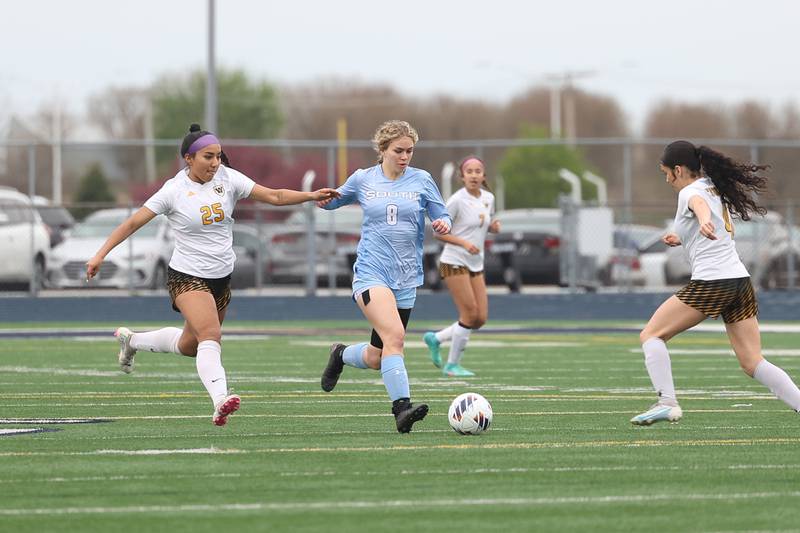 Plainfield South’s Olivia Ostrowski works the ball upfield against Joliet West on Thursday, April 18, 2024.