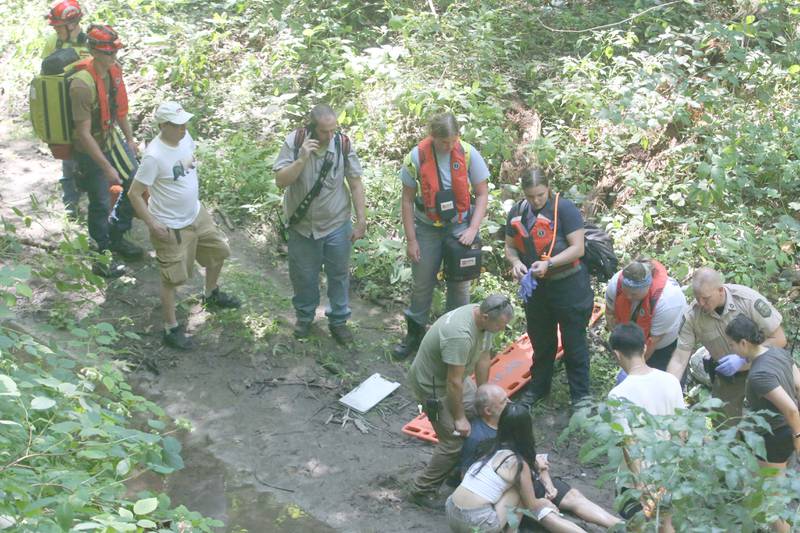 Oglesby and Utica Fire and EMS attend to  a rescue at the bottom of La Salle Canyon  for a male subject who fell at La Salle Canyon on Wednesday, July 17, 2024 at Starved Rock State Park.