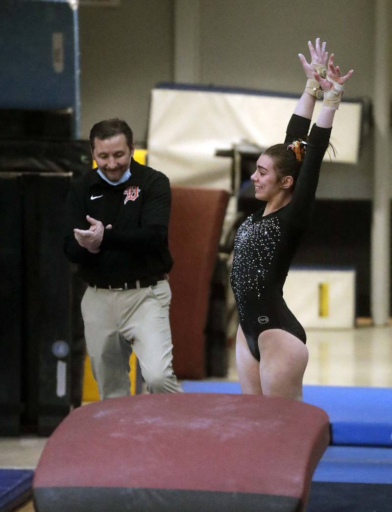 DeKalb’s Madeline Kees competes on the vault during the IHSA Girls Gymnastics State Finals Saturday February 19, 2022 at Palatine High School.