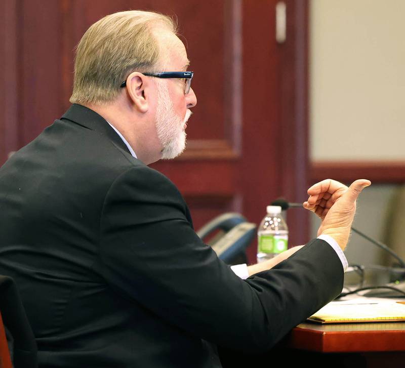 Douglas Moeller, (right) former DeKalb School District 428 superintendent, asks a question of Circuit Court Judge Philip Montgomery after his sentencing Tuesday, Jan. 1, 2023, at the DeKalb County Courthouse in Sycamore. Moeller was sentenced to community service after being found guilty of one count of non-consensual dissemination of a private sexual image, a class 4 felony.